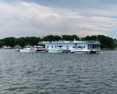 How Far Would You Go to Save a 99-Year-Old Wooden Houseboat?